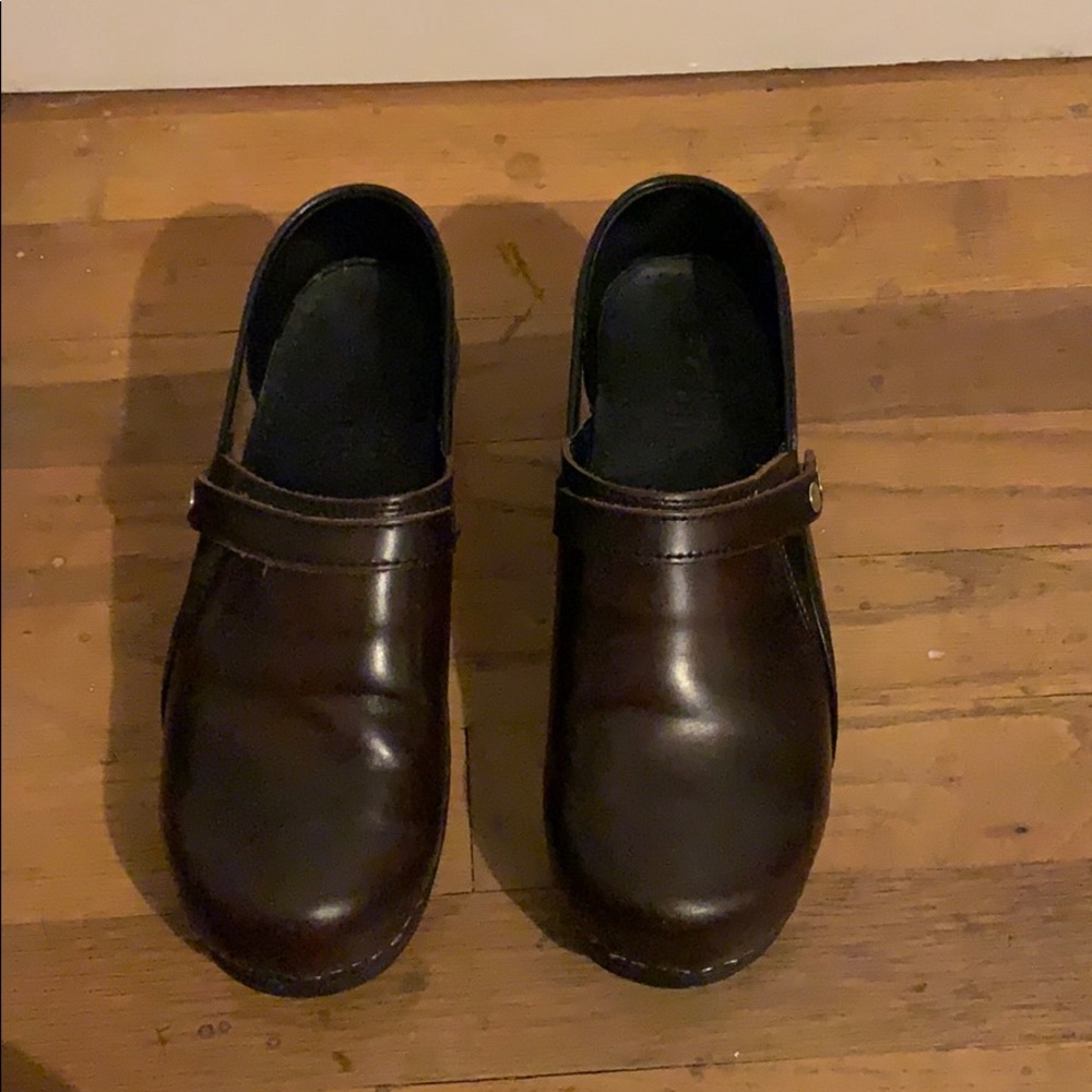 Brown leather clogs